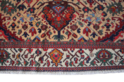 Carpet detail with a red medallion and geometric floral ornaments