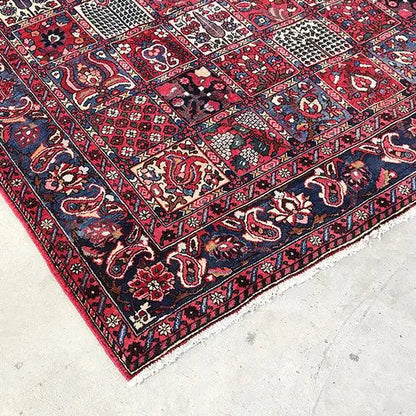 Bakhtiari rug (319x219 cm) close-up: floral and geometric patterns in red, blue, and beige