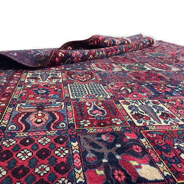 Bakhtiari rug (320x214 cm) in detail: colorful patchwork squares, rolled edge.