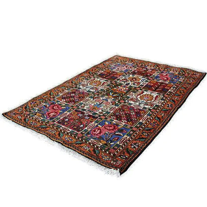 Bakhtiari rug (145x105 cm) laid flat with a colorful ornamental pattern