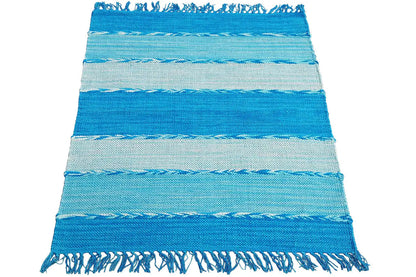 Striped kilim dhurrie rug in turquoise and light blue, with fringes along the edges
