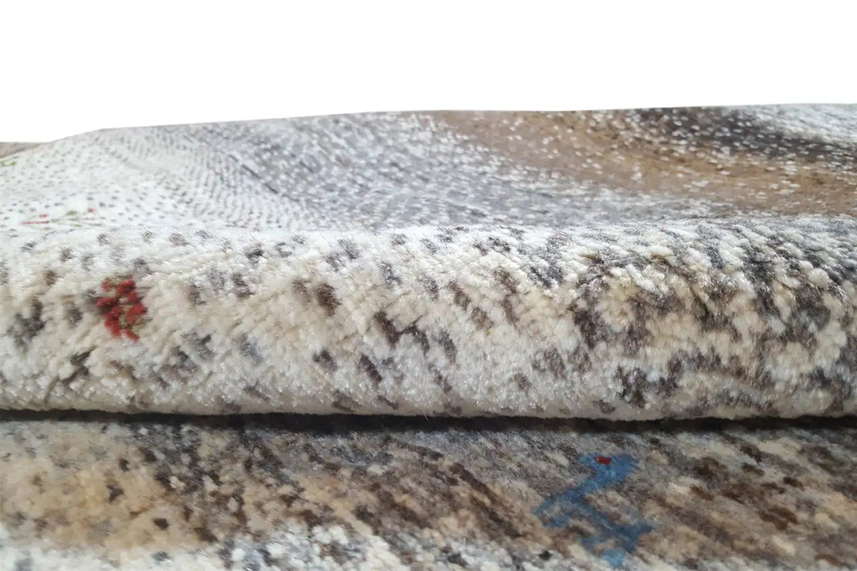 Gabbeh rug detail: wool pile edge with multicolored accents