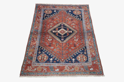 Qashqai rug 3809 with central diamond medallion, blue border and decorative ornaments