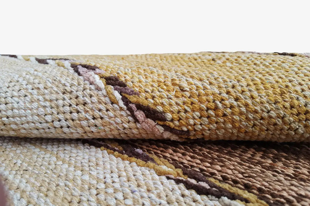 Close-up: kilim rug fabric with a dense texture and contrasting color stripes