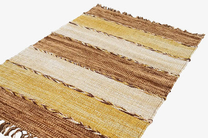 Top view: kilim rug with stripes in yellow, cream, and brown