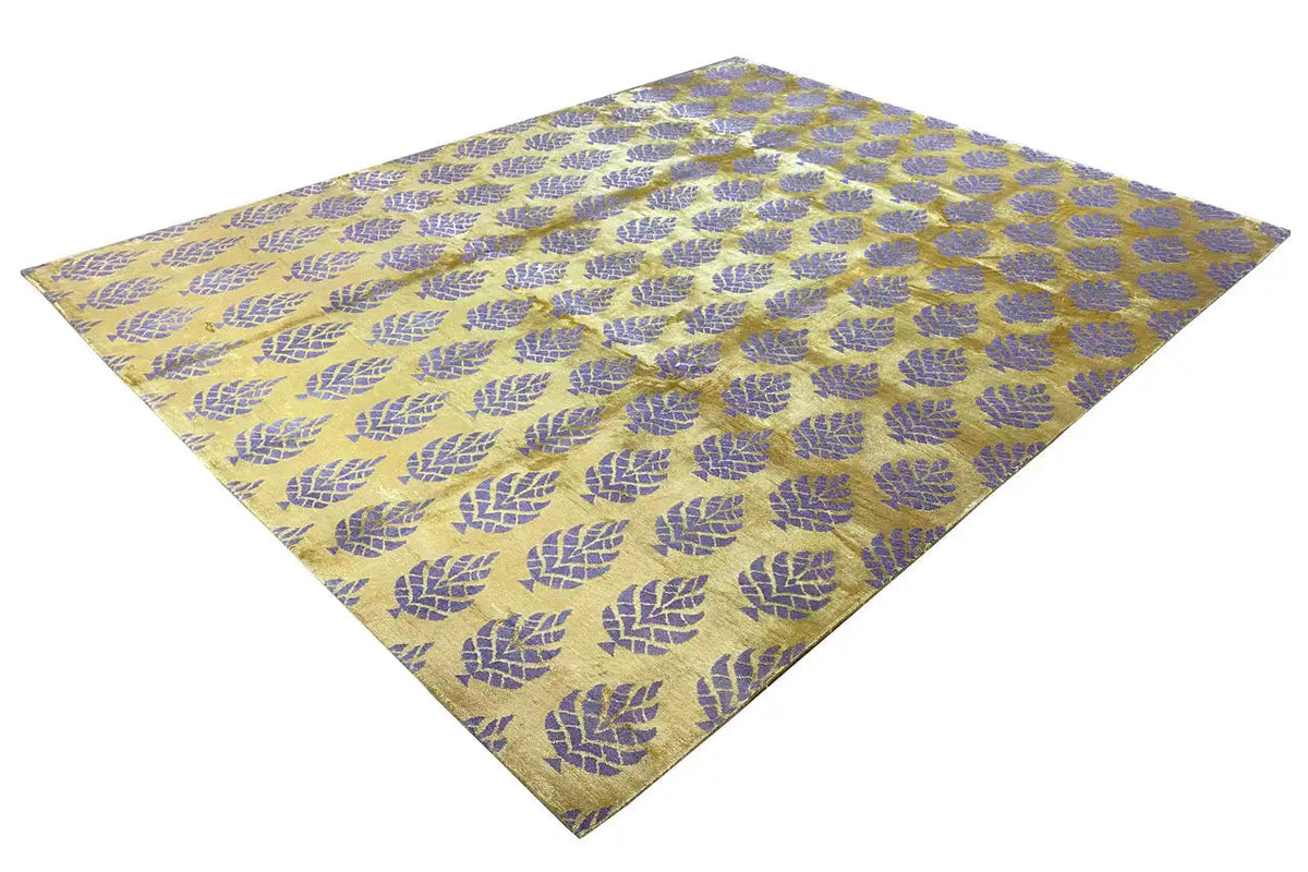 Designer rug with a yellowish-purple pattern in a diagonal diamond design, laid flat