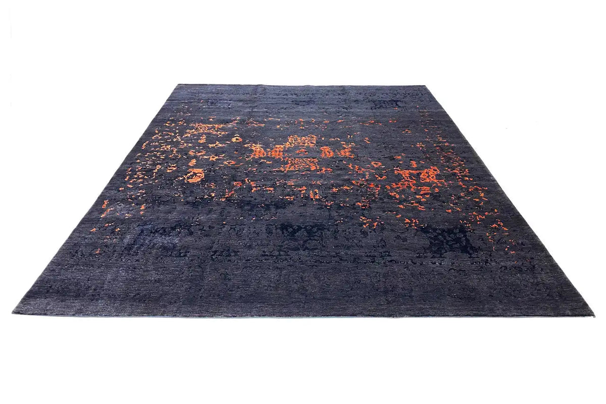 Dark blue rug with orange splatter patterns, rectangular; flat-woven look