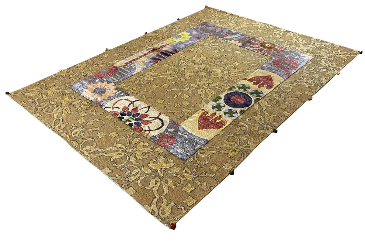 Rectangular designer rug: golden brown with patchwork motifs and borders