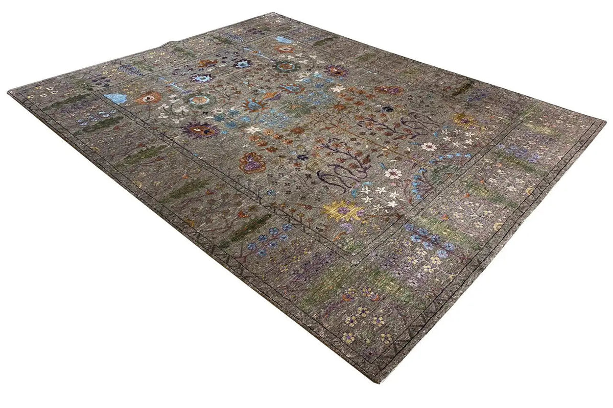 Designer rug with a gray background, colorful medallion and floral motifs, laid diagonally
