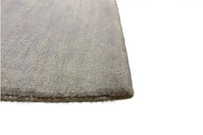 Carpet corner with short-pile fibers in a light beige look