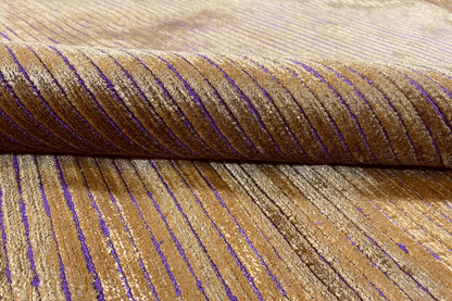 Carpet with sand-beige pile and purple longitudinal stripes; high, fine pile texture.