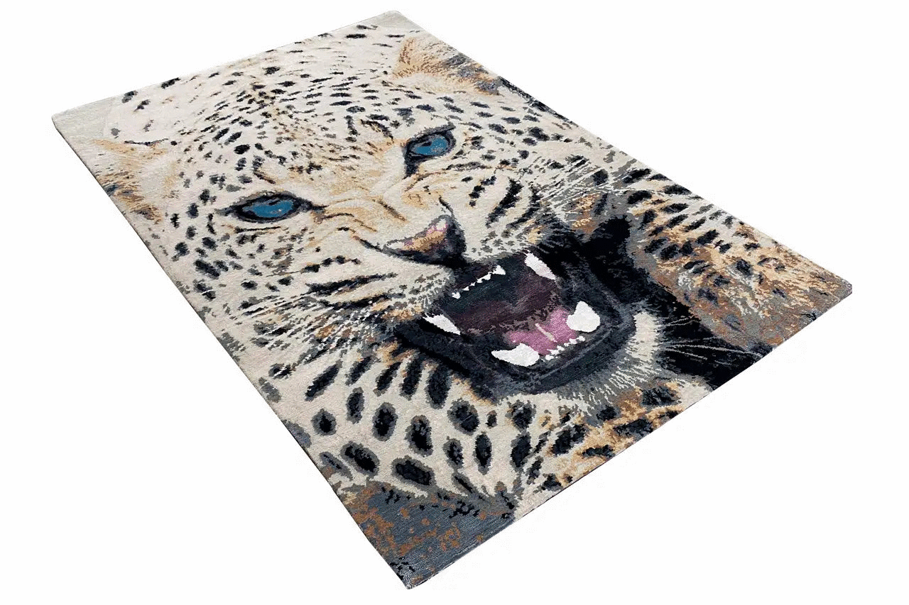 Designer rug featuring a leopard head in a diagonal composition, blue-rimmed eyes, and spots