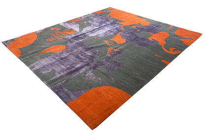 Designer rug with purple and gray areas and orange Hamsa motifs
