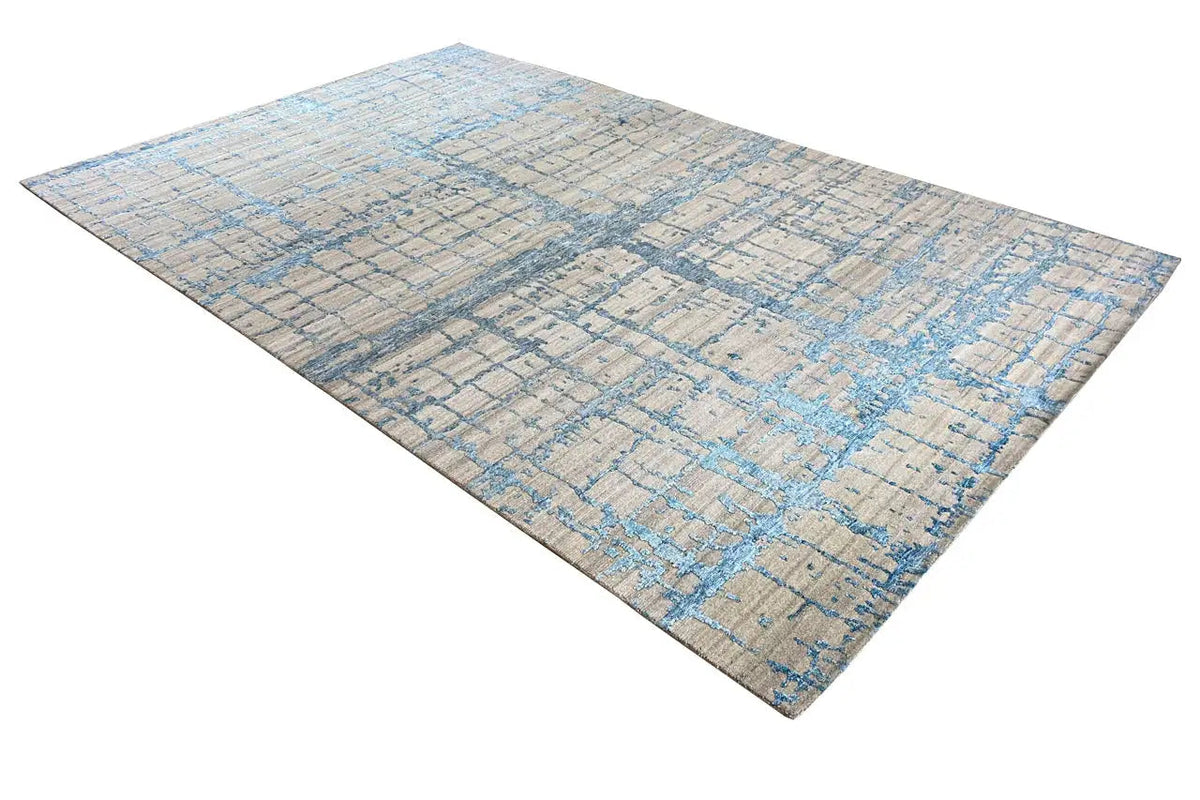 Rectangular designer rug 310x197 cm with a beige base and blue decorative latticework