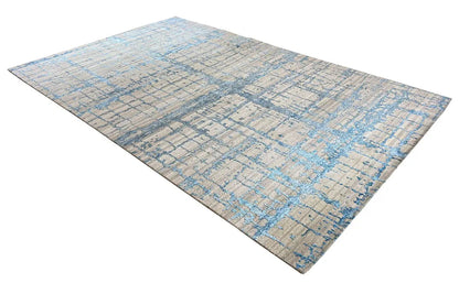 Rectangular designer rug 310x197 cm with a beige base and blue decorative latticework