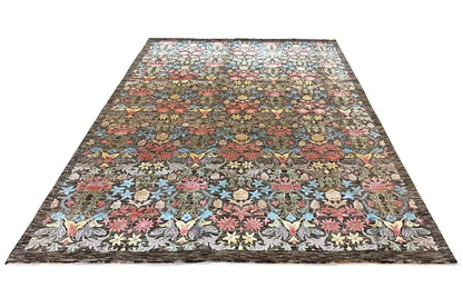 Rectangular rug with a dense floral and bird pattern, multicolored border