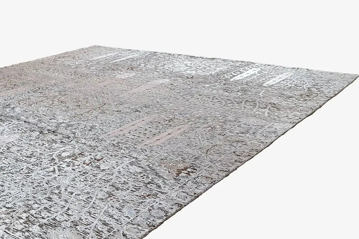 Rug: detailed gray-blue distressed pattern, photographed diagonally lengthwise