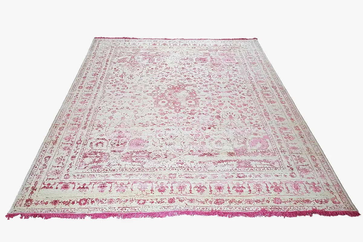 Designer rug with paisley and ornamental patterns, cream and pink, even pile surface