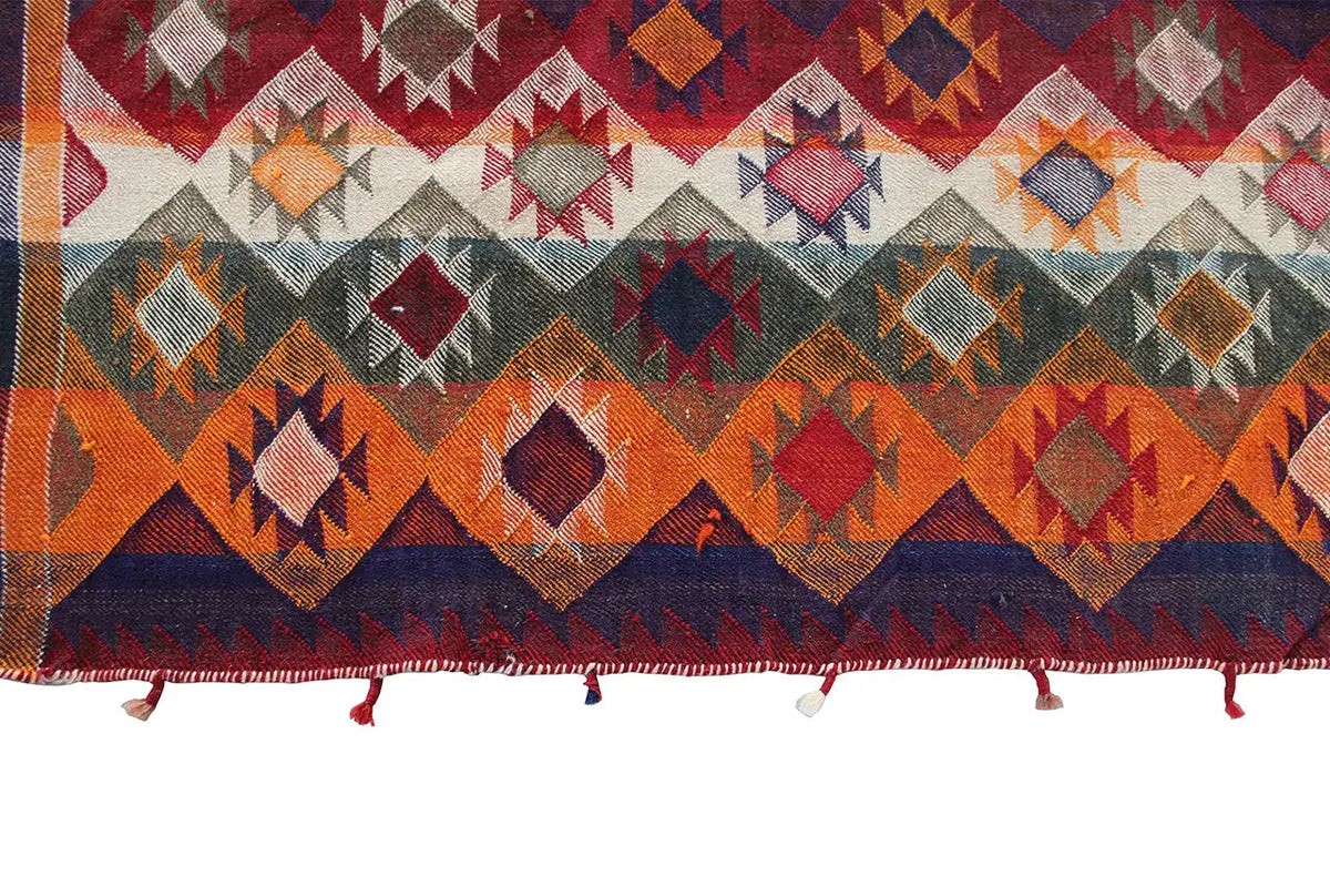 Rug with diamond and zigzag patterns, colorful edge fringes