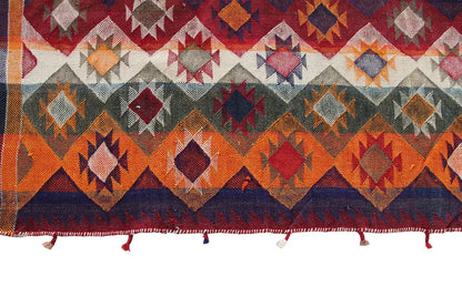 Rug with diamond and zigzag patterns, colorful edge fringes