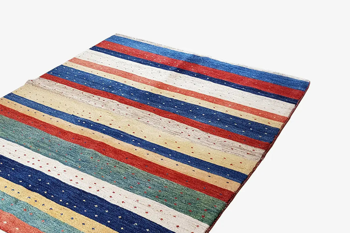 Gabbeh rug with distinct horizontal stripes in blue, red, beige, and green, rectangular.