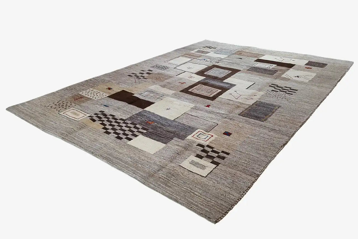 Gabbeh rug with geometric patchwork in gray, beige, and brown