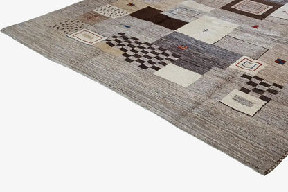 Gabbeh rug with a patchwork pattern of checks and squares in light shades of gray