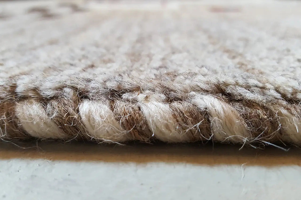 Gabbeh rug close-up: dense pile and visible rug edge