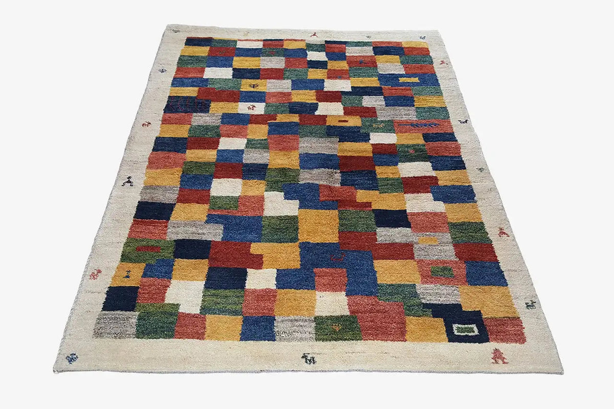 Gabbeh rug 203x147 cm with multicolored checked patchwork on a beige background