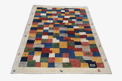 Gabbeh rug 203x147 cm with multicolored checked patchwork on a beige background