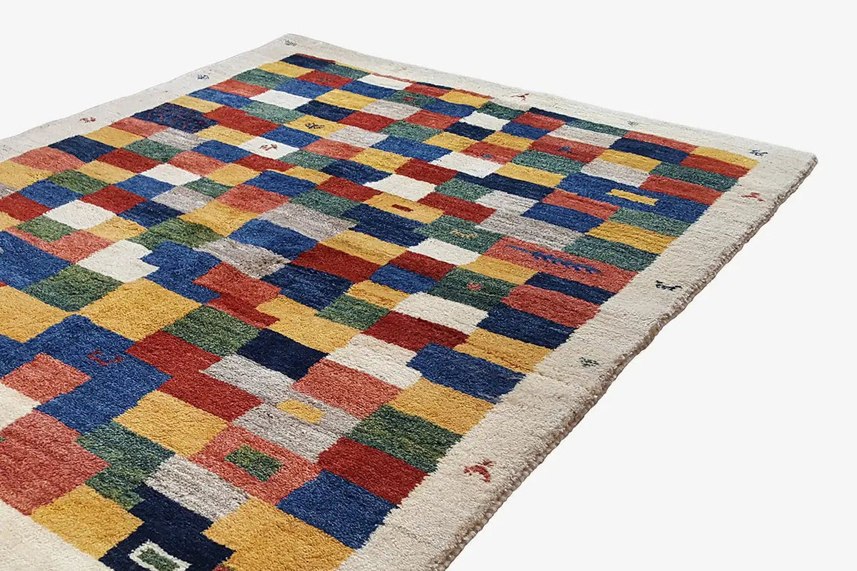 Gabbeh rug 203x147 cm, large-scale patchwork pattern in blue, red, green, and yellow