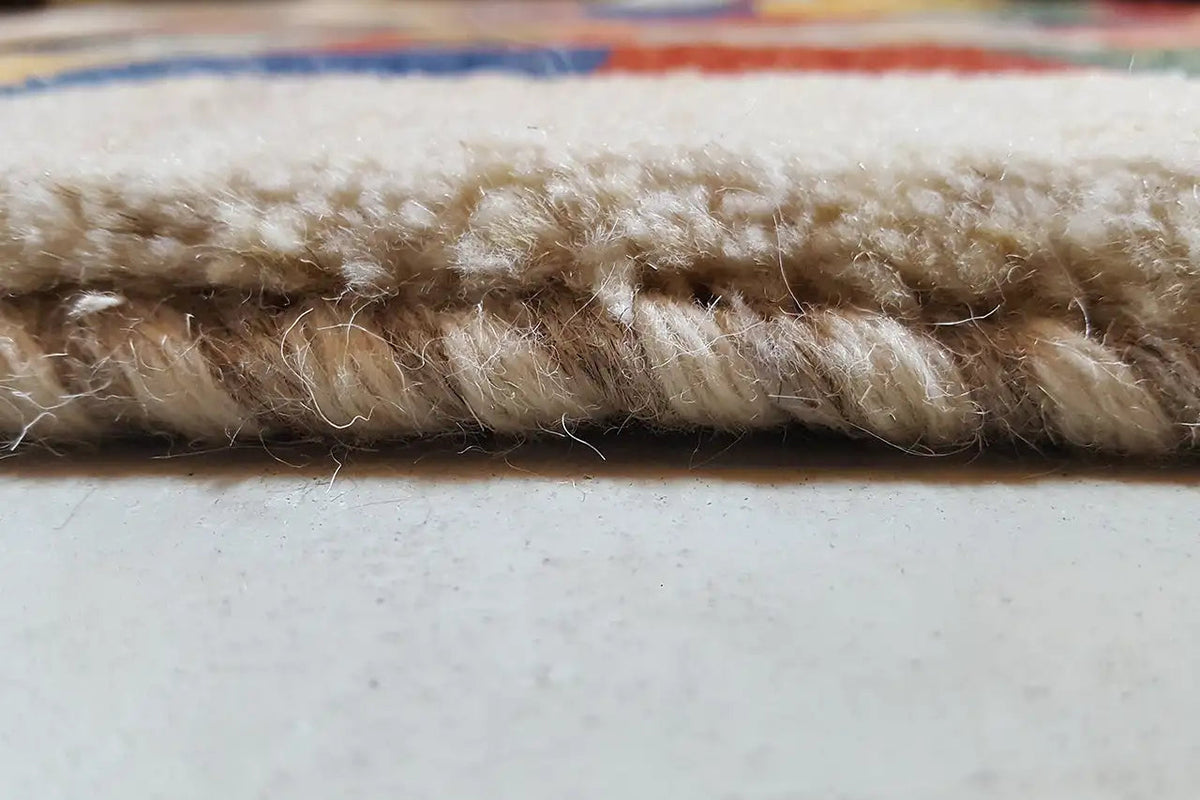 Gabbeh rug 203x147 cm, close-up of the knotted wool pile with texture