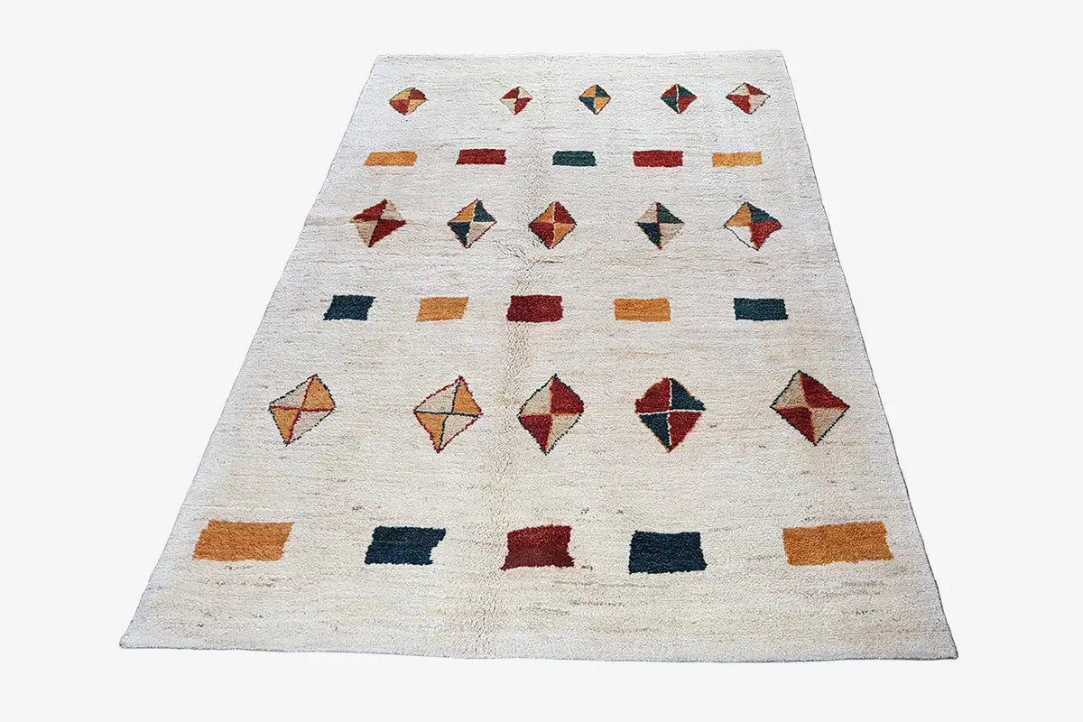 Gabbeh rug with symmetrical diamond and line patterns in many colors