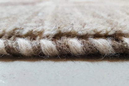 Gabbeh rug pile in detail, dense and fluffy, beige color tone