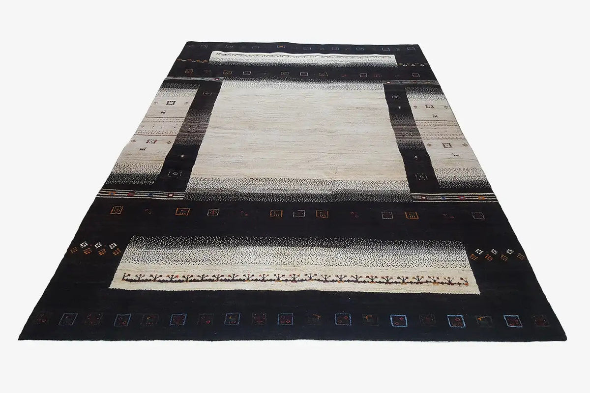 Gabbeh rug (303x201 cm) with a beige inner field, dark borders, and delicate ornaments