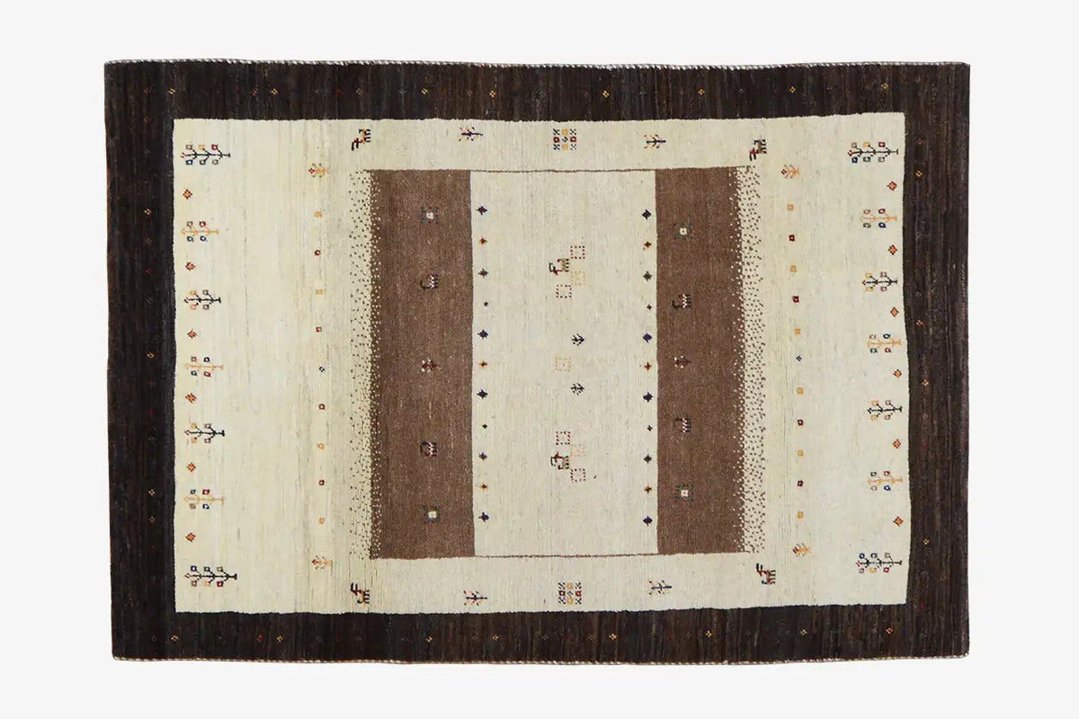 Gabbeh rug, 175×117 cm: cream-colored look with brown areas and a dark border