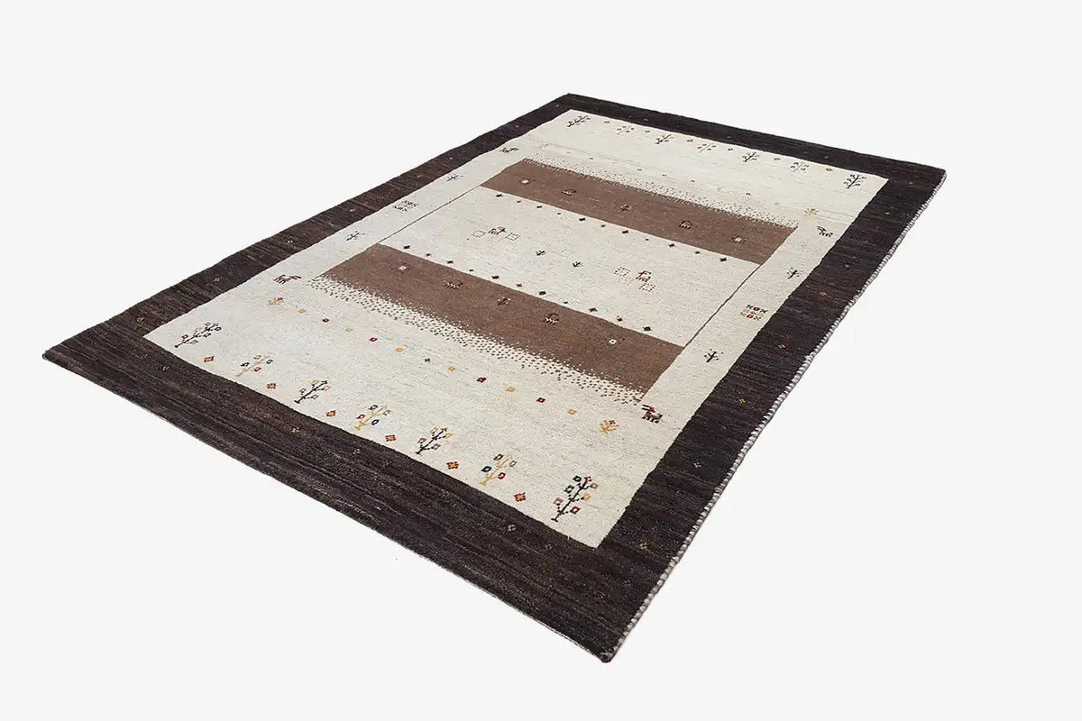 Gabbeh rug 175×117 cm, angled: cream with brown rectangles and a dark border