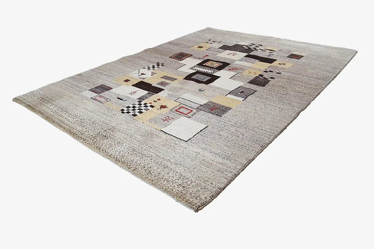 Gabbeh rug 208x152 cm with geometric patchwork in gray, beige, and multicolored accents