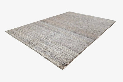 Gabbeh rug in natural and gray tones, rectangular, with finished edges
