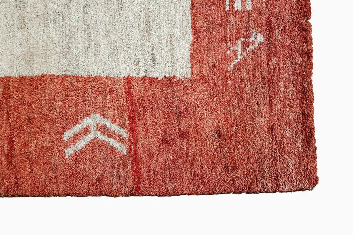 Gabbeh rug 200x133 cm, detail: red-and-white pattern with visible pile texture
