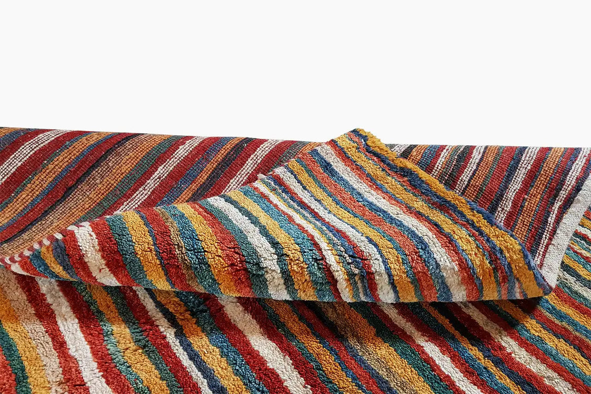 Gabbeh rug (199x149 cm) with a raised surface; multicolored stripes in detail