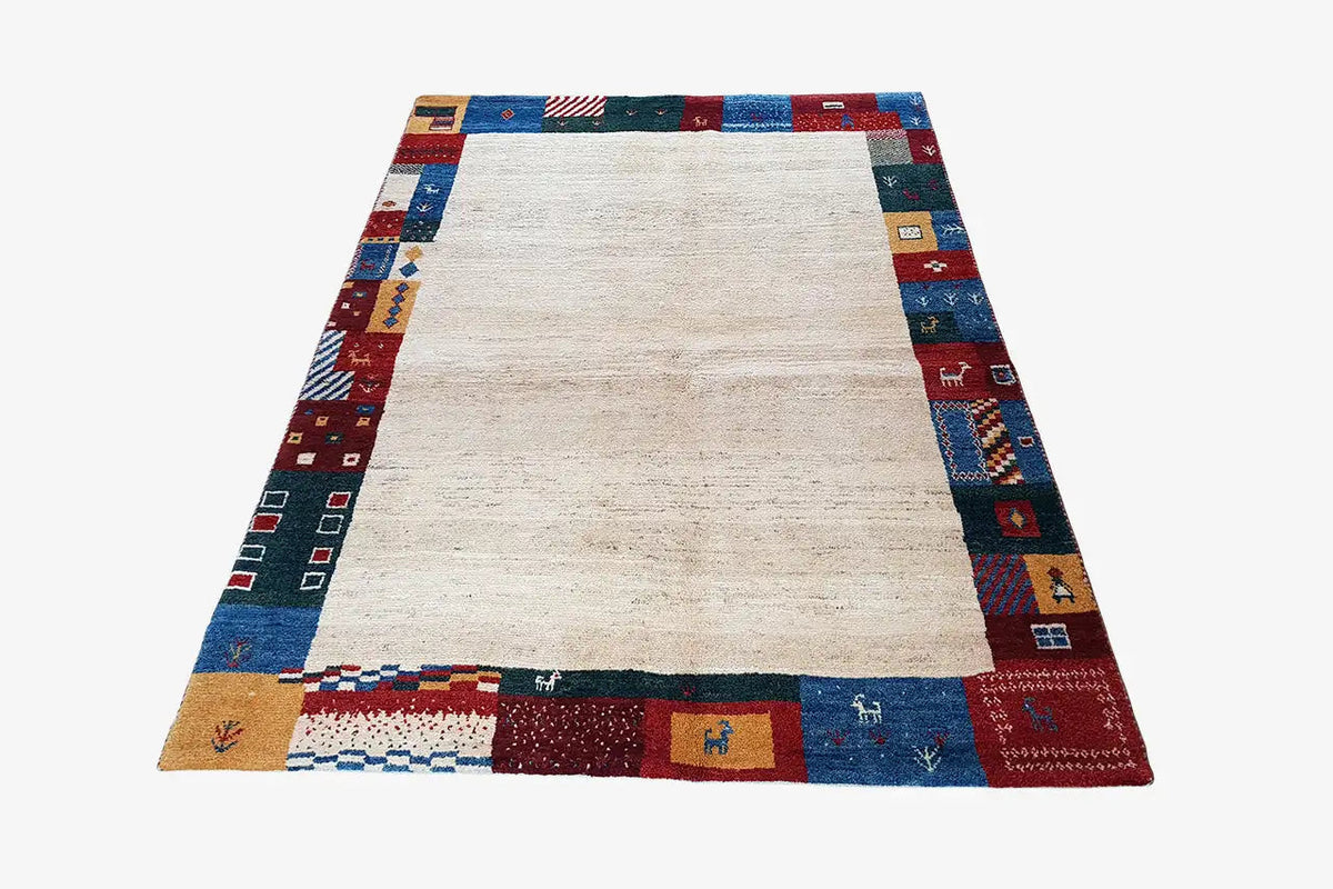 Gabbeh rug 210x149 cm, beige center; border with colorful geometric motifs