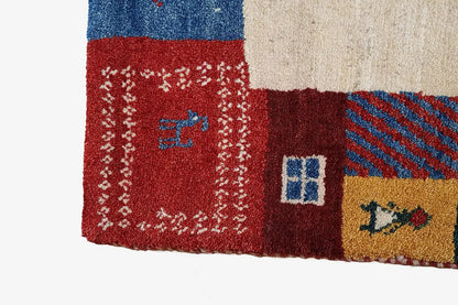 Gabbeh rug 210x149 cm Detail at the edge: red, blue and beige patterned area