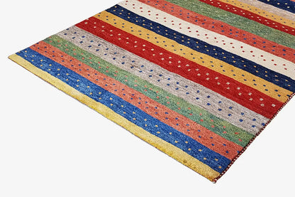 Gabbeh rug, folded diagonally: horizontal stripes in red, blue, green, and yellow