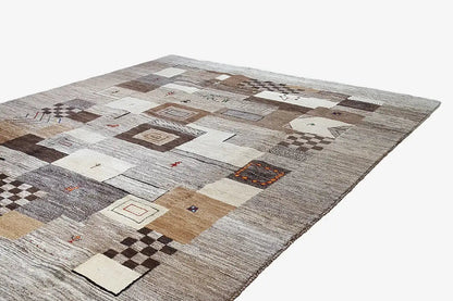 Rug with geometric squares and colorful accents in gray, beige, and brown