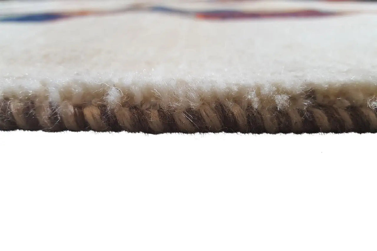 Edge binding with dense wool fringes on the new wool rug