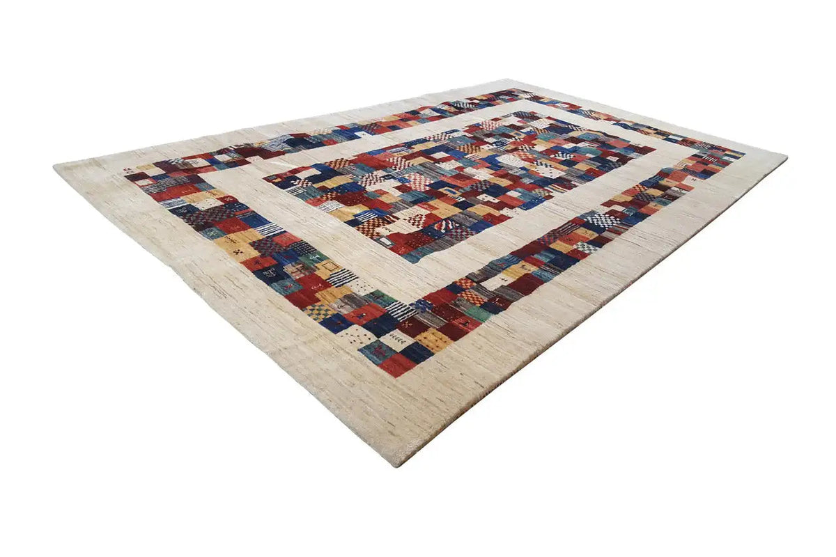 Gabbeh rug with a patchwork pattern, beige background and multicolored diamonds, diagonal