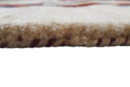 Gabbeh rug: Detail of the wool pile, short fibers on a light background, visible texture