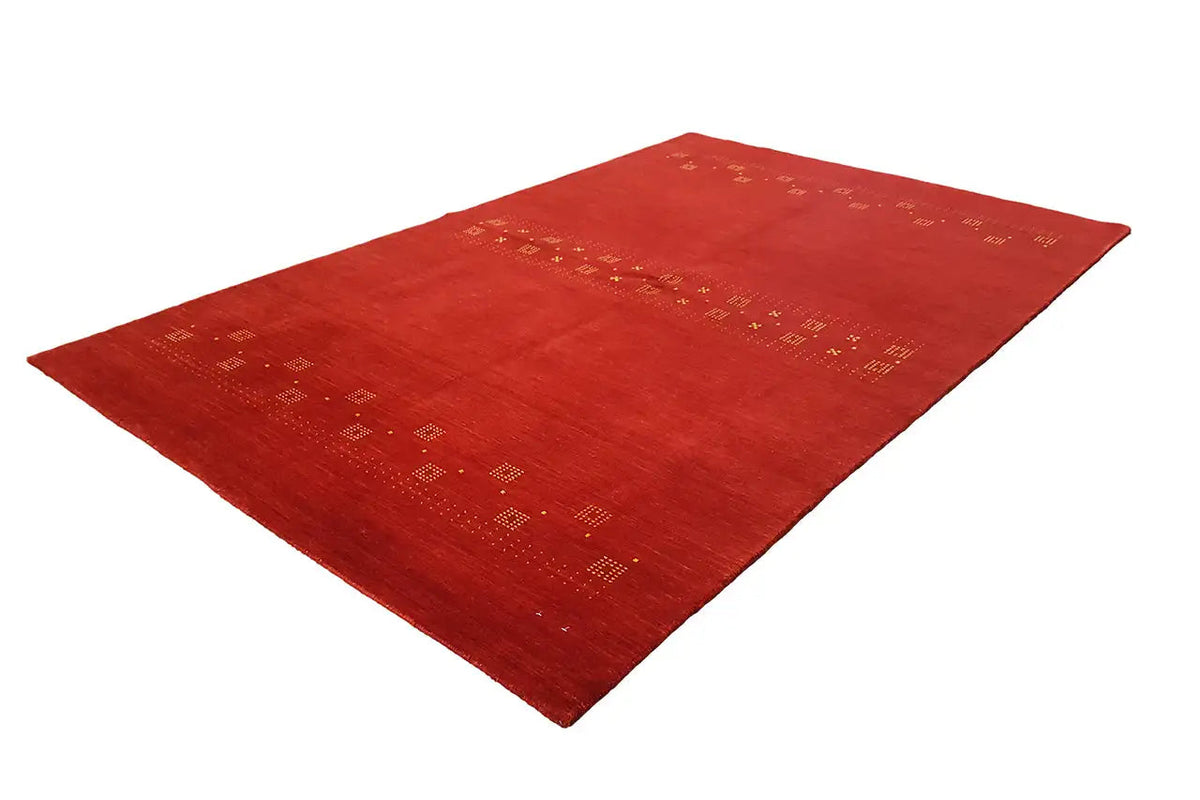 Gabbeh rug, red rug with subtle ornamentation in rows