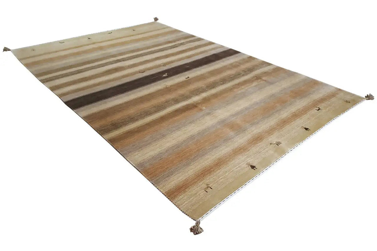Gabbeh rug, shown at an angle: beige field with brown stripes and fringe along the edges.